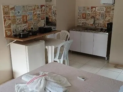Cama e cozinha do estúdio