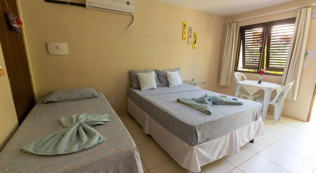 Estúdio com cama de casal e cama de solteiro