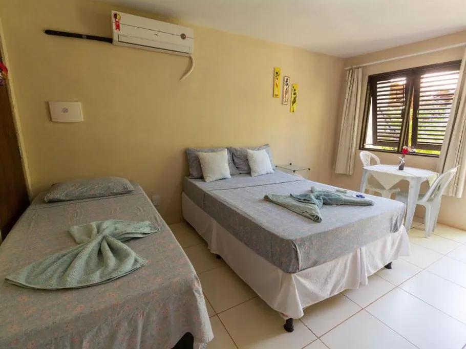 Estúdio com cama de casal e cama de solteiro